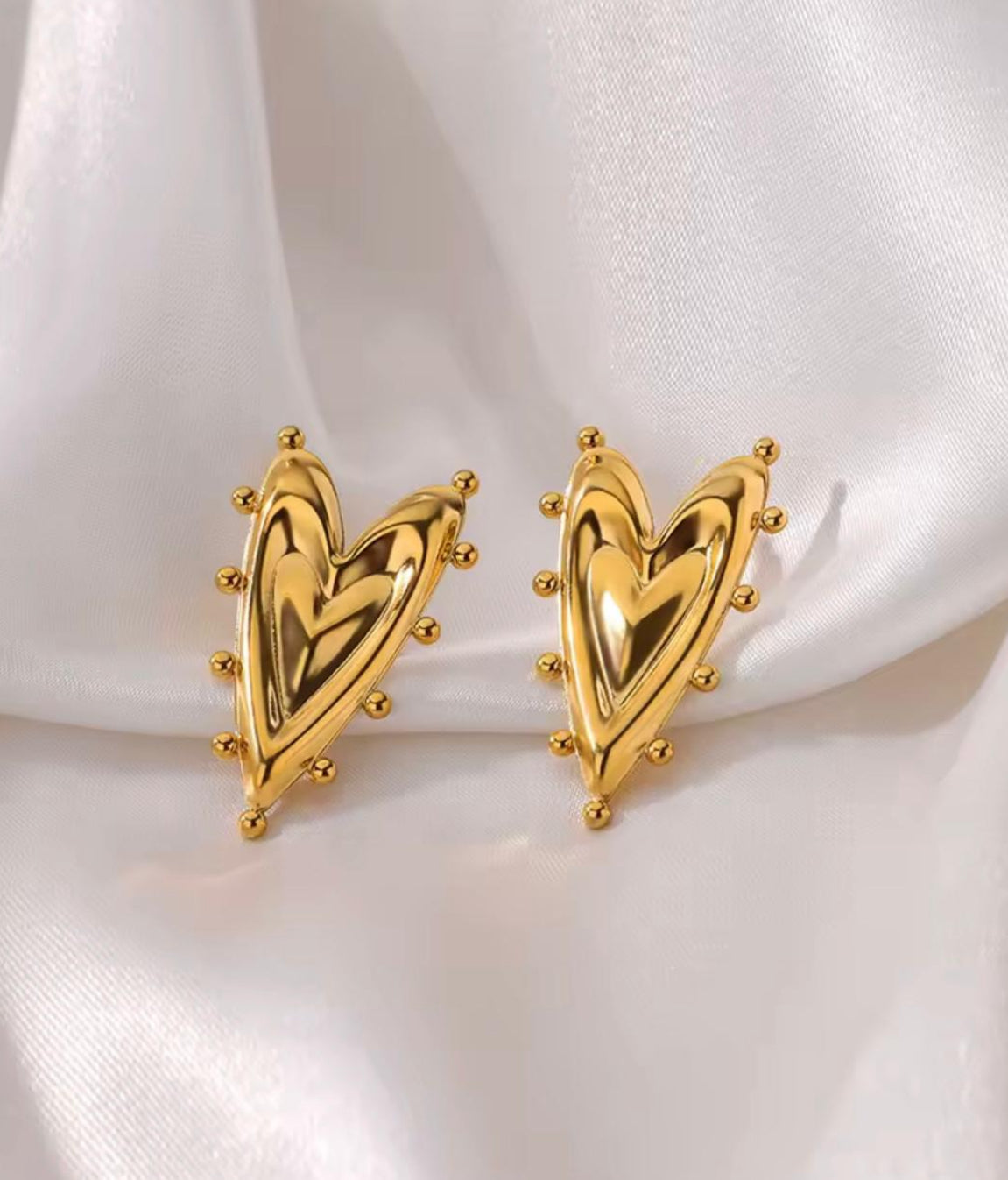 Triple heart ring